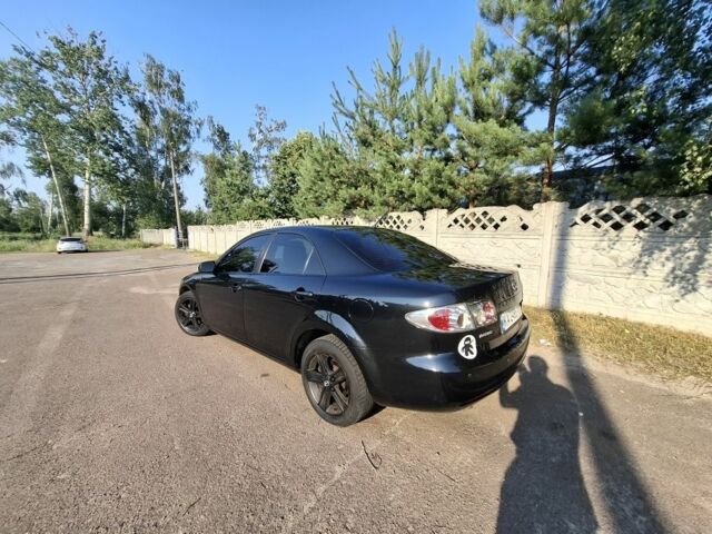 Черный Мазда 6, объемом двигателя 2 л и пробегом 335 тыс. км за 4650 $, фото 4 на Automoto.ua