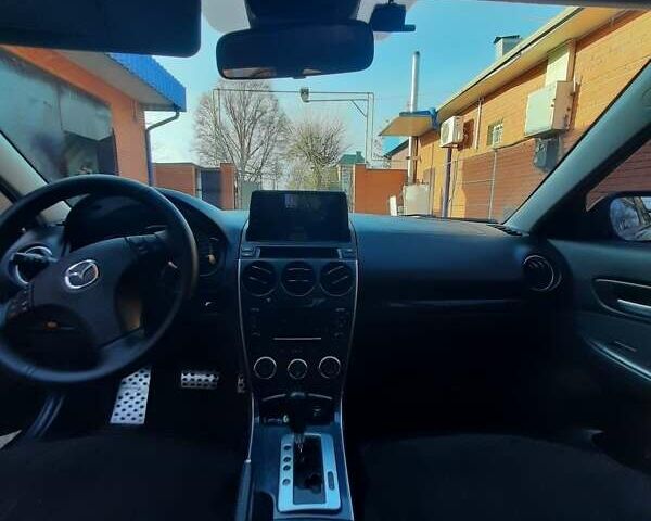 Черный Мазда 6, объемом двигателя 2 л и пробегом 215 тыс. км за 5900 $, фото 8 на Automoto.ua