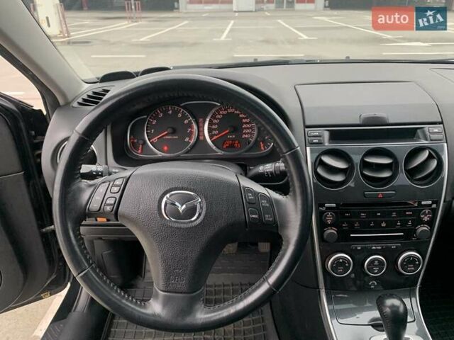 Черный Мазда 6, объемом двигателя 2 л и пробегом 209 тыс. км за 5550 $, фото 25 на Automoto.ua