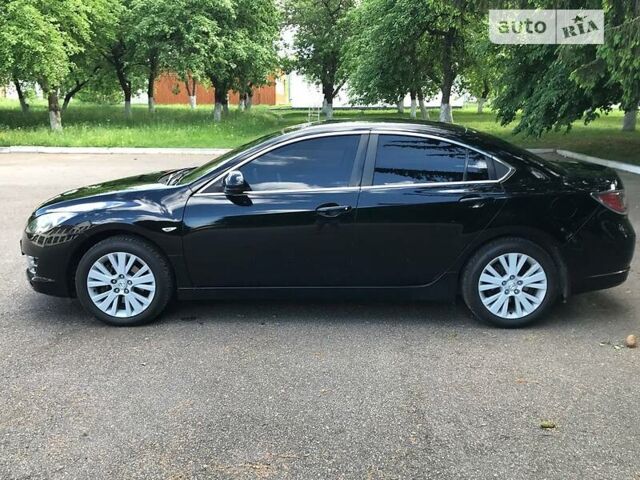 Чорний Мазда 6, об'ємом двигуна 1.8 л та пробігом 195 тис. км за 7850 $, фото 6 на Automoto.ua