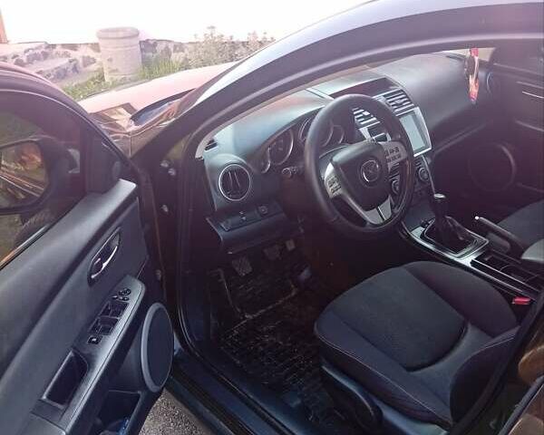 Чорний Мазда 6, об'ємом двигуна 1.8 л та пробігом 191 тис. км за 6700 $, фото 4 на Automoto.ua