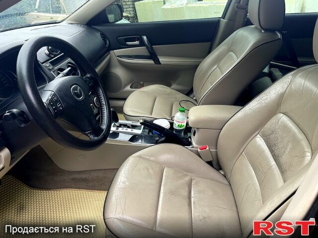 Черный Мазда 6, объемом двигателя 2 л и пробегом 289 тыс. км за 6200 $, фото 1 на Automoto.ua