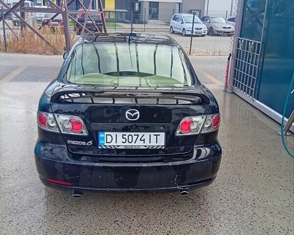 Черный Мазда 6, объемом двигателя 2.26 л и пробегом 198 тыс. км за 3700 $, фото 1 на Automoto.ua