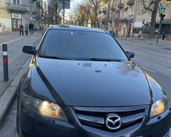 Черный Мазда 6, объемом двигателя 2.3 л и пробегом 269 тыс. км за 5300 $, фото 1 на Automoto.ua