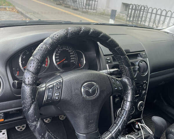 Черный Мазда 6, объемом двигателя 2.3 л и пробегом 269 тыс. км за 5300 $, фото 12 на Automoto.ua