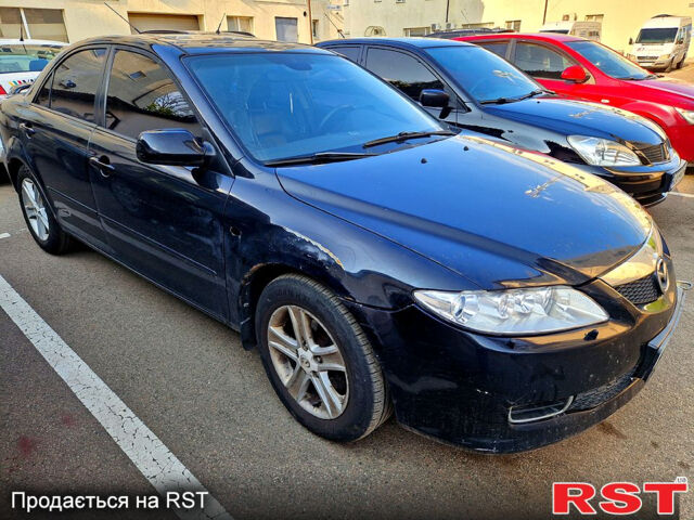 Черный Мазда 6, объемом двигателя 2 л и пробегом 198 тыс. км за 2300 $, фото 1 на Automoto.ua