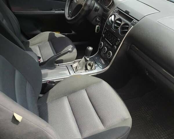 Черный Мазда 6, объемом двигателя 2 л и пробегом 235 тыс. км за 5350 $, фото 2 на Automoto.ua