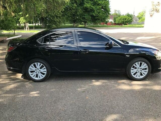 Чорний Мазда 6, об'ємом двигуна 1.8 л та пробігом 195 тис. км за 7850 $, фото 3 на Automoto.ua