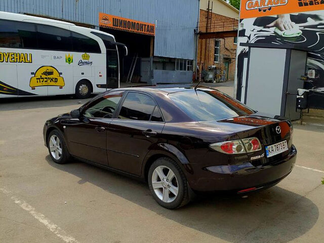 Черный Мазда 6, объемом двигателя 2 л и пробегом 235 тыс. км за 5350 $, фото 12 на Automoto.ua
