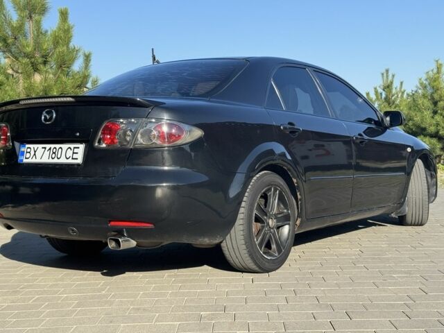 Черный Мазда 6, объемом двигателя 2 л и пробегом 180 тыс. км за 4500 $, фото 1 на Automoto.ua