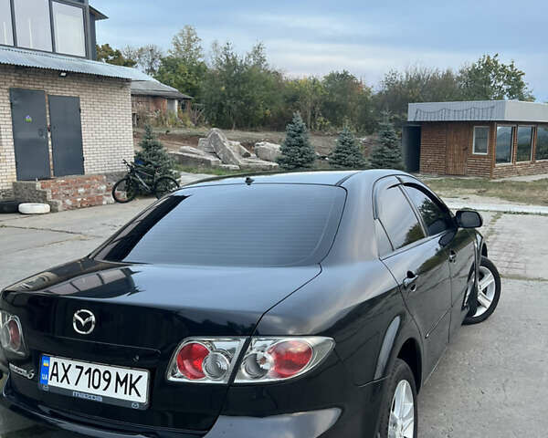 Черный Мазда 6, объемом двигателя 2 л и пробегом 270 тыс. км за 5300 $, фото 4 на Automoto.ua