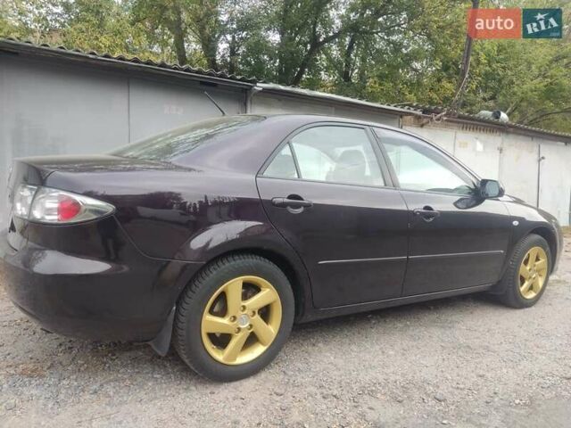 Чорний Мазда 6, об'ємом двигуна 2 л та пробігом 187 тис. км за 7000 $, фото 9 на Automoto.ua
