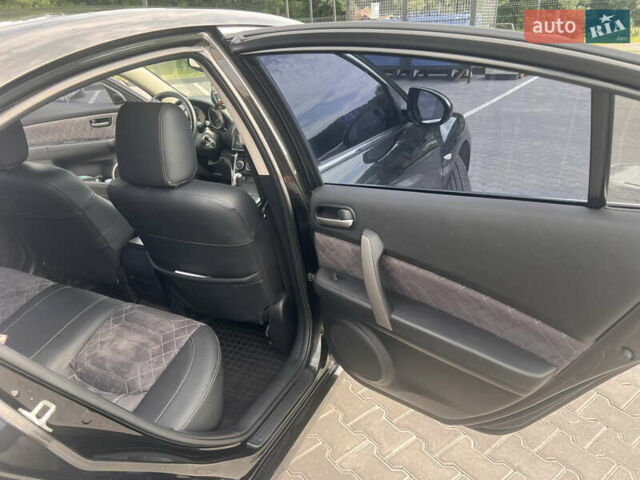 Черный Мазда 6, объемом двигателя 2 л и пробегом 220 тыс. км за 7100 $, фото 6 на Automoto.ua
