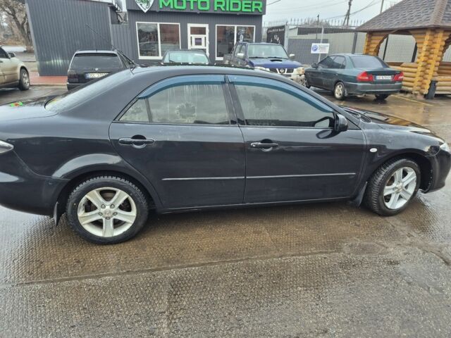 Чорний Мазда 6, об'ємом двигуна 1.8 л та пробігом 306 тис. км за 4200 $, фото 1 на Automoto.ua