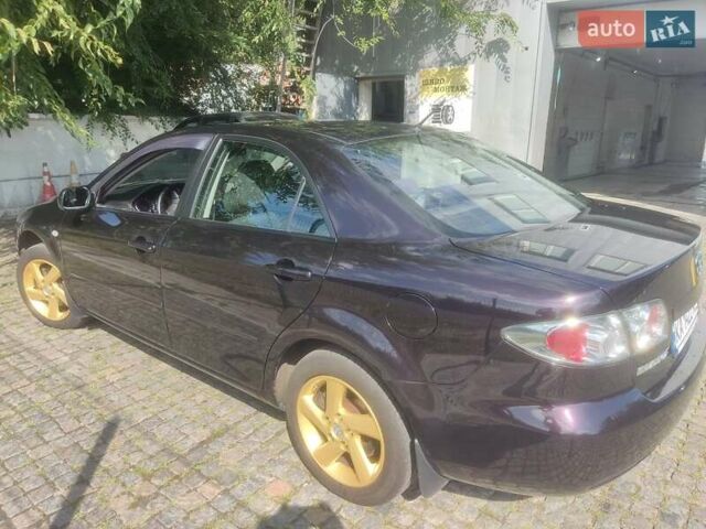 Чорний Мазда 6, об'ємом двигуна 2 л та пробігом 187 тис. км за 7000 $, фото 6 на Automoto.ua