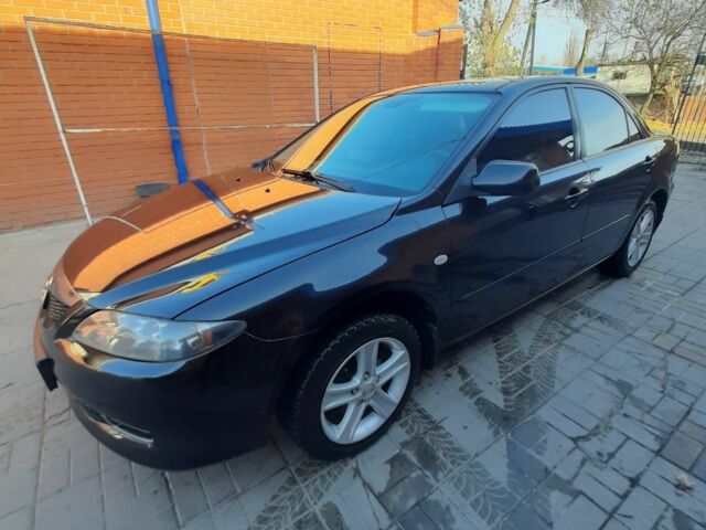 Чорний Мазда 6, об'ємом двигуна 2 л та пробігом 215 тис. км за 5900 $, фото 4 на Automoto.ua