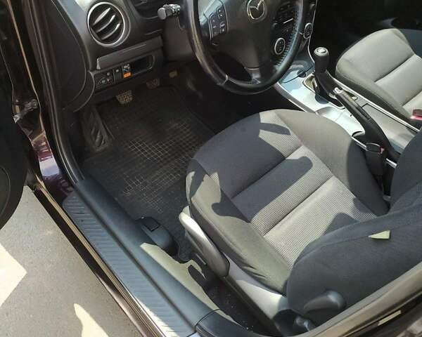 Черный Мазда 6, объемом двигателя 2 л и пробегом 235 тыс. км за 5350 $, фото 18 на Automoto.ua