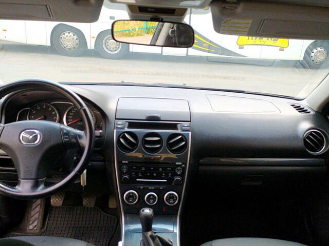 Черный Мазда 6, объемом двигателя 2 л и пробегом 235 тыс. км за 5350 $, фото 1 на Automoto.ua