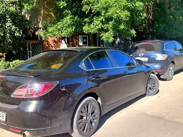 Черный Мазда 6, объемом двигателя 2 л и пробегом 246 тыс. км за 6800 $, фото 1 на Automoto.ua