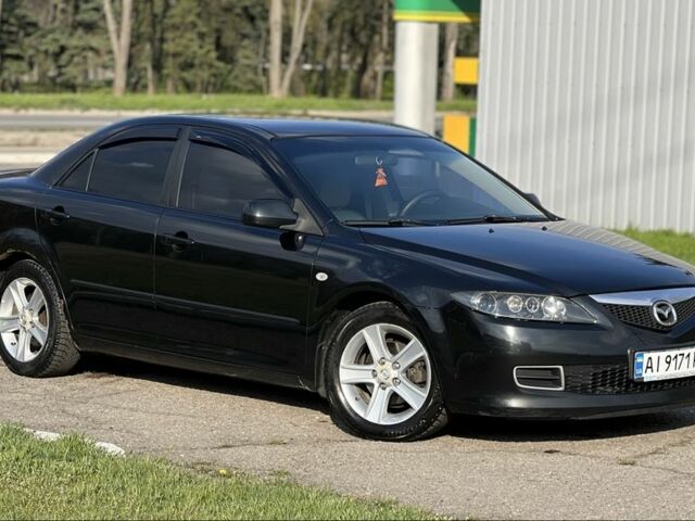Черный Мазда 6, объемом двигателя 2 л и пробегом 314 тыс. км за 5800 $, фото 4 на Automoto.ua