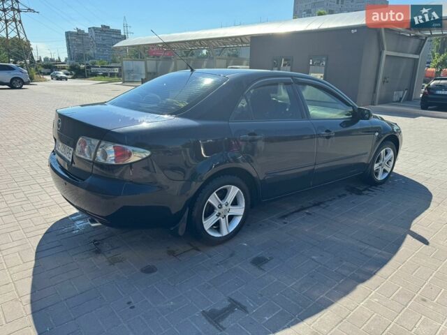 Черный Мазда 6, объемом двигателя 2 л и пробегом 302 тыс. км за 6500 $, фото 4 на Automoto.ua