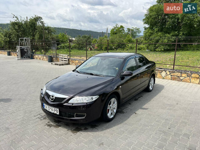 Черный Мазда 6, объемом двигателя 2 л и пробегом 221 тыс. км за 5200 $, фото 2 на Automoto.ua