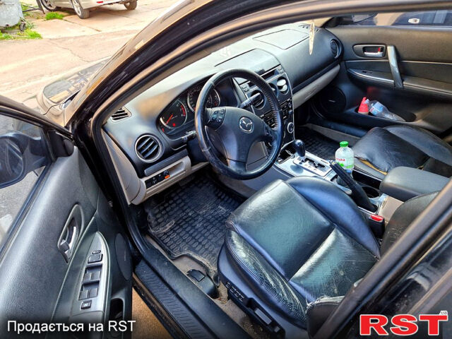 Черный Мазда 6, объемом двигателя 2 л и пробегом 198 тыс. км за 2300 $, фото 4 на Automoto.ua