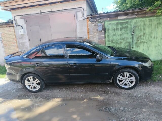 Чорний Мазда 6, об'ємом двигуна 2 л та пробігом 179 тис. км за 4005 $, фото 1 на Automoto.ua