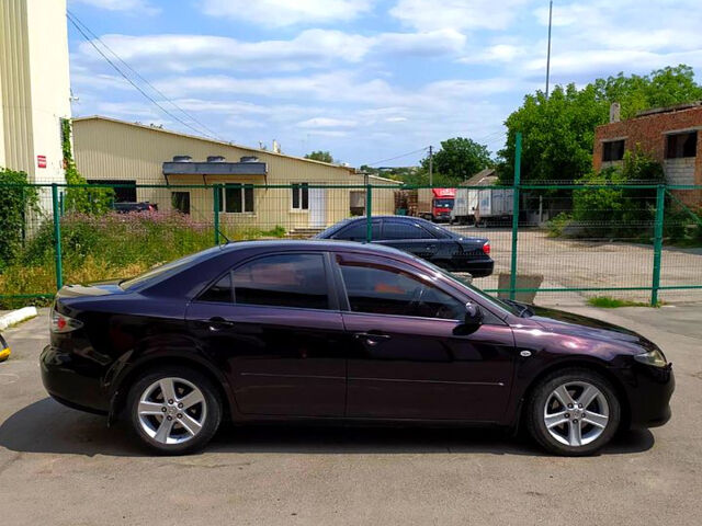 Черный Мазда 6, объемом двигателя 2 л и пробегом 235 тыс. км за 5350 $, фото 7 на Automoto.ua