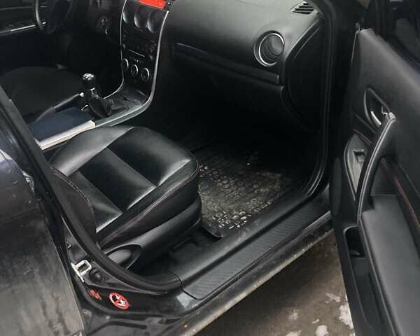 Чорний Мазда 6, об'ємом двигуна 1.8 л та пробігом 314 тис. км за 4200 $, фото 9 на Automoto.ua