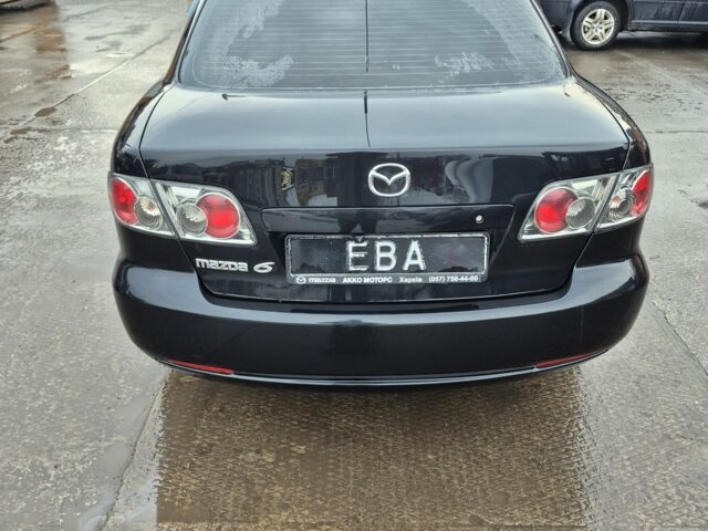 Чорний Мазда 6, об'ємом двигуна 1.8 л та пробігом 306 тис. км за 4200 $, фото 2 на Automoto.ua