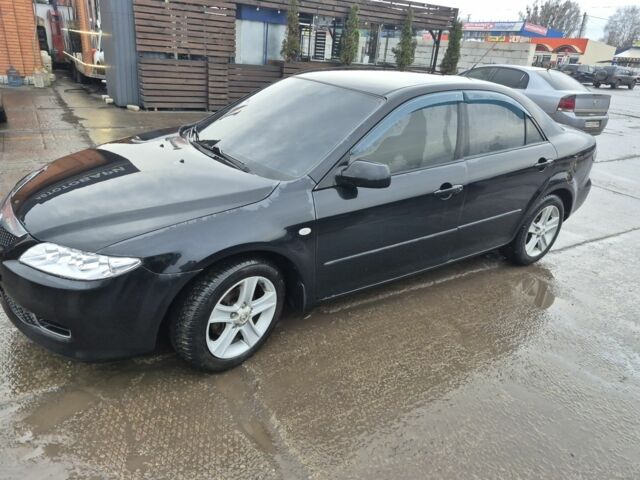 Чорний Мазда 6, об'ємом двигуна 1.8 л та пробігом 306 тис. км за 4200 $, фото 3 на Automoto.ua