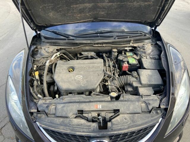 Черный Мазда 6, объемом двигателя 2 л и пробегом 180 тыс. км за 7700 $, фото 14 на Automoto.ua