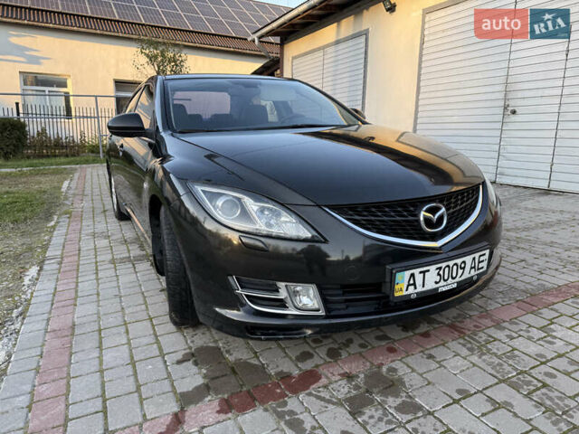 Черный Мазда 6, объемом двигателя 2 л и пробегом 309 тыс. км за 6200 $, фото 5 на Automoto.ua