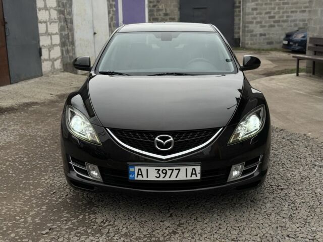 Черный Мазда 6, объемом двигателя 2 л и пробегом 263 тыс. км за 5850 $, фото 1 на Automoto.ua