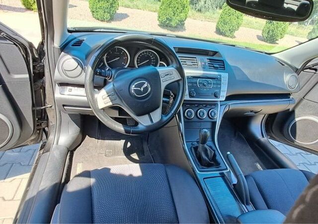 Черный Мазда 6, объемом двигателя 2 л и пробегом 140 тыс. км за 6500 $, фото 4 на Automoto.ua
