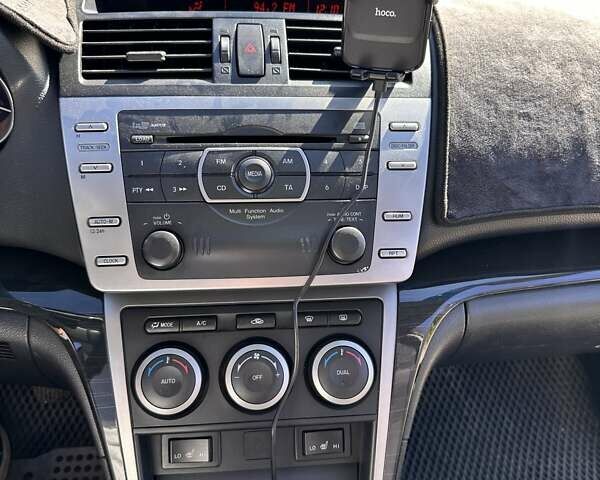 Черный Мазда 6, объемом двигателя 2 л и пробегом 180 тыс. км за 8000 $, фото 13 на Automoto.ua