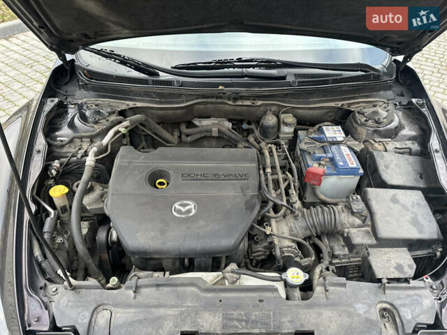 Черный Мазда 6, объемом двигателя 1.8 л и пробегом 238 тыс. км за 6800 $, фото 14 на Automoto.ua
