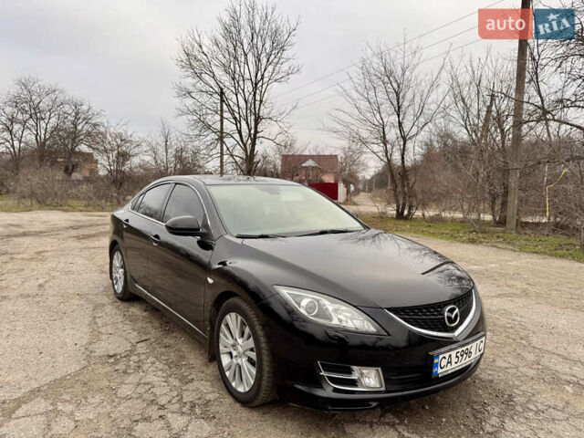 Черный Мазда 6, объемом двигателя 2 л и пробегом 258 тыс. км за 6900 $, фото 6 на Automoto.ua