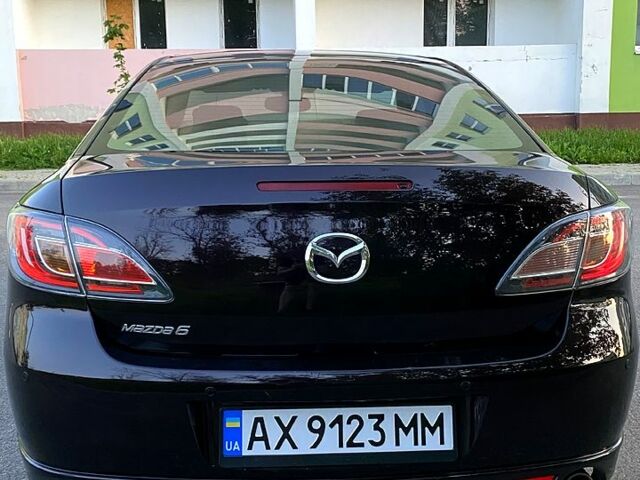 Черный Мазда 6, объемом двигателя 2 л и пробегом 242 тыс. км за 7000 $, фото 3 на Automoto.ua