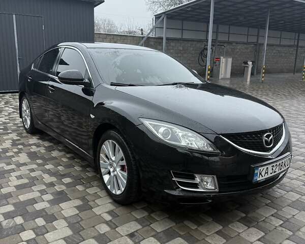 Черный Мазда 6, объемом двигателя 2 л и пробегом 280 тыс. км за 6500 $, фото 1 на Automoto.ua