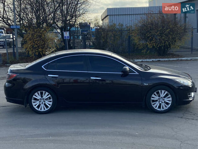 Черный Мазда 6, объемом двигателя 2 л и пробегом 180 тыс. км за 7700 $, фото 3 на Automoto.ua