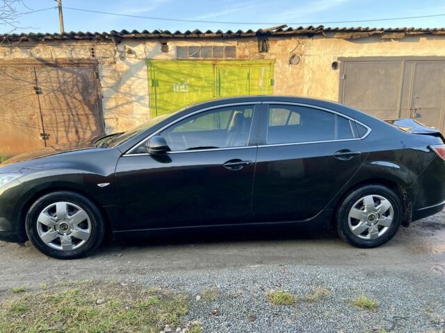 Черный Мазда 6, объемом двигателя 2.4 л и пробегом 234 тыс. км за 3699 $, фото 3 на Automoto.ua