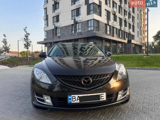 Черный Мазда 6, объемом двигателя 2 л и пробегом 248 тыс. км за 8899 $, фото 1 на Automoto.ua