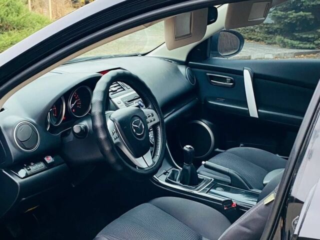 Черный Мазда 6, объемом двигателя 2 л и пробегом 266 тыс. км за 6600 $, фото 7 на Automoto.ua