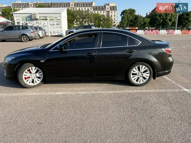 Чорний Мазда 6, об'ємом двигуна 2 л та пробігом 312 тис. км за 6600 $, фото 4 на Automoto.ua