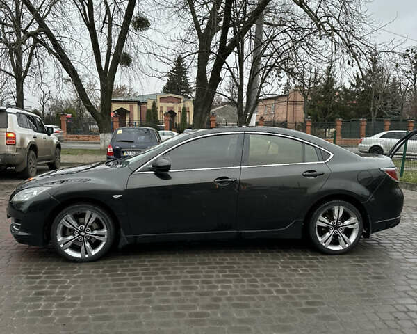 Чорний Мазда 6, об'ємом двигуна 1.8 л та пробігом 252 тис. км за 7300 $, фото 1 на Automoto.ua
