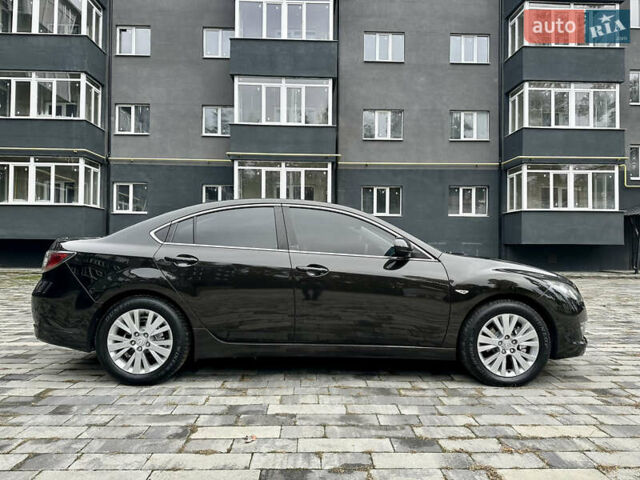 Черный Мазда 6, объемом двигателя 2 л и пробегом 253 тыс. км за 6500 $, фото 7 на Automoto.ua