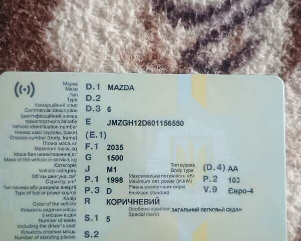 Черный Мазда 6, объемом двигателя 2 л и пробегом 241 тыс. км за 7000 $, фото 6 на Automoto.ua