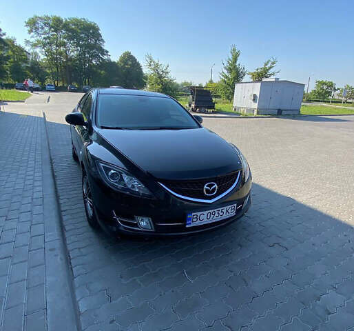 Черный Мазда 6, объемом двигателя 2 л и пробегом 281 тыс. км за 6600 $, фото 1 на Automoto.ua